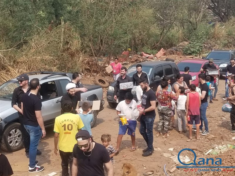 الجالية اللبنانية في البرغواي يقدمون الطعام على الفقراء بناسبة العاشر من محرم 