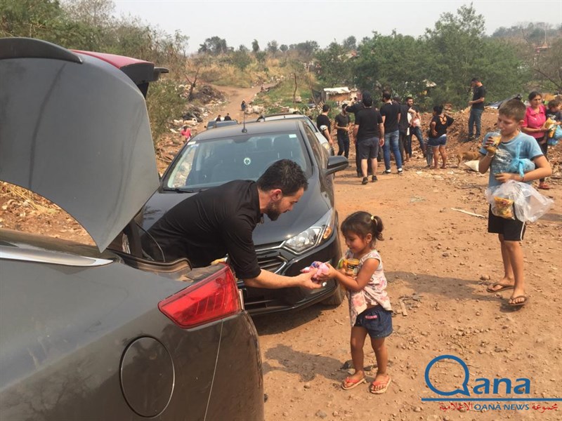الجالية اللبنانية في البرغواي يقدمون الطعام على الفقراء بناسبة العاشر من محرم 